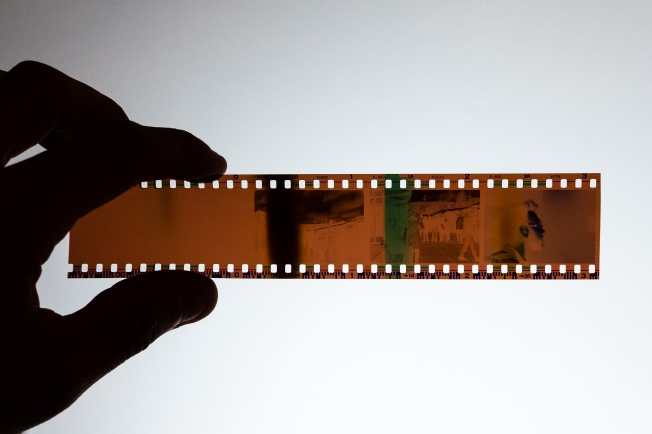 A film sample showing over-exposure in vertical bars across the film.
