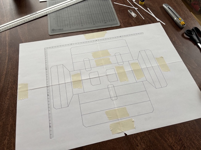 An earlier prototype. My printer has a 5mm dead zone around the edge of the page, you can see the trimmings in the top right corner of the photo (and also that my knife wasn’t sharp enough and tore the page).